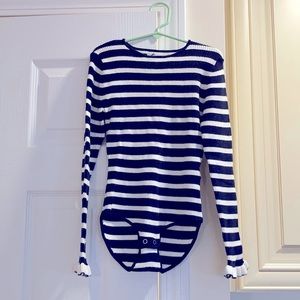 Black and cream striped knit bodysuit.